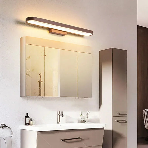 Applique miroir LED marron café au-dessus d'un meuble de salle de bain